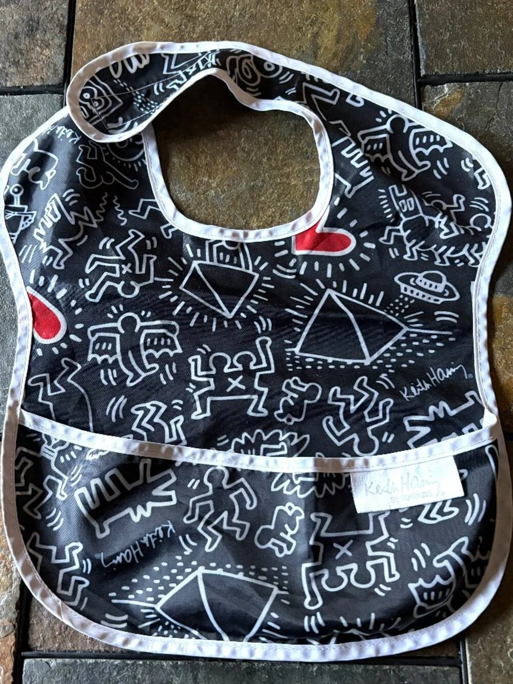 Keith Haring x Bumkins baby bib pop art black white red